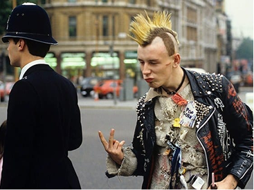 A punk and a police officer, London 1977